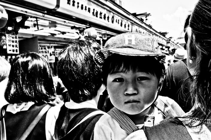 Tokyo Close up of a child at Asakusa. Street photography by Victor Borst