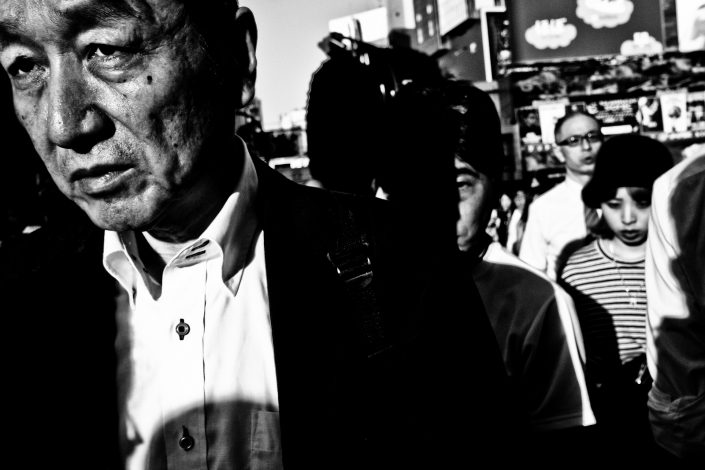 Close up portrait from a man in Tokyo, Shibuya. Street Photography by Victor Borst